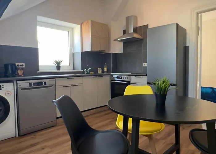 Фото Ferienwohnung Mit Privatparkplatz Nahe Innenstadt Ноймюнстер